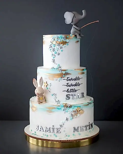 yıldız pasta – fil ve tavşan figürlü bebek doğum pastası