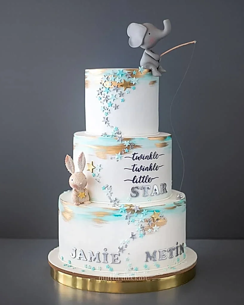 yıldız pasta – fil ve tavşan figürlü bebek doğum pastası